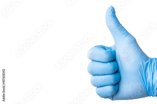 Hand in blue glove isolated on white with thumb up.