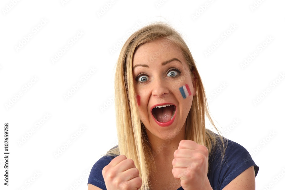 French soccer fan cheers football team in the national colors.