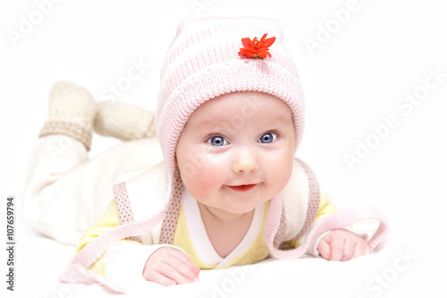 newborn european baby girl boy with red flower 3 months old