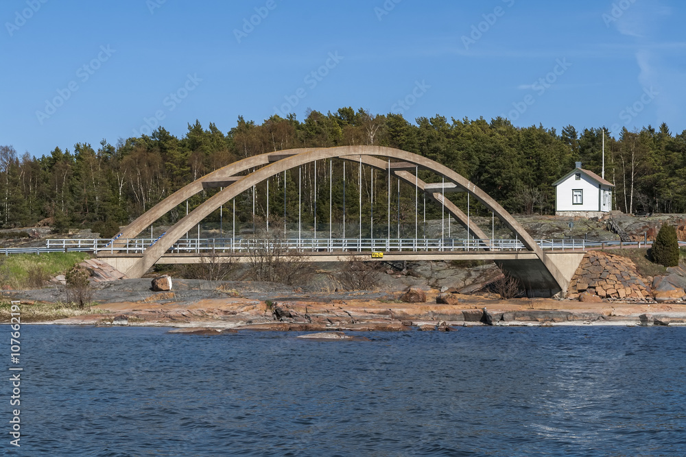 Arch bridge across the strait