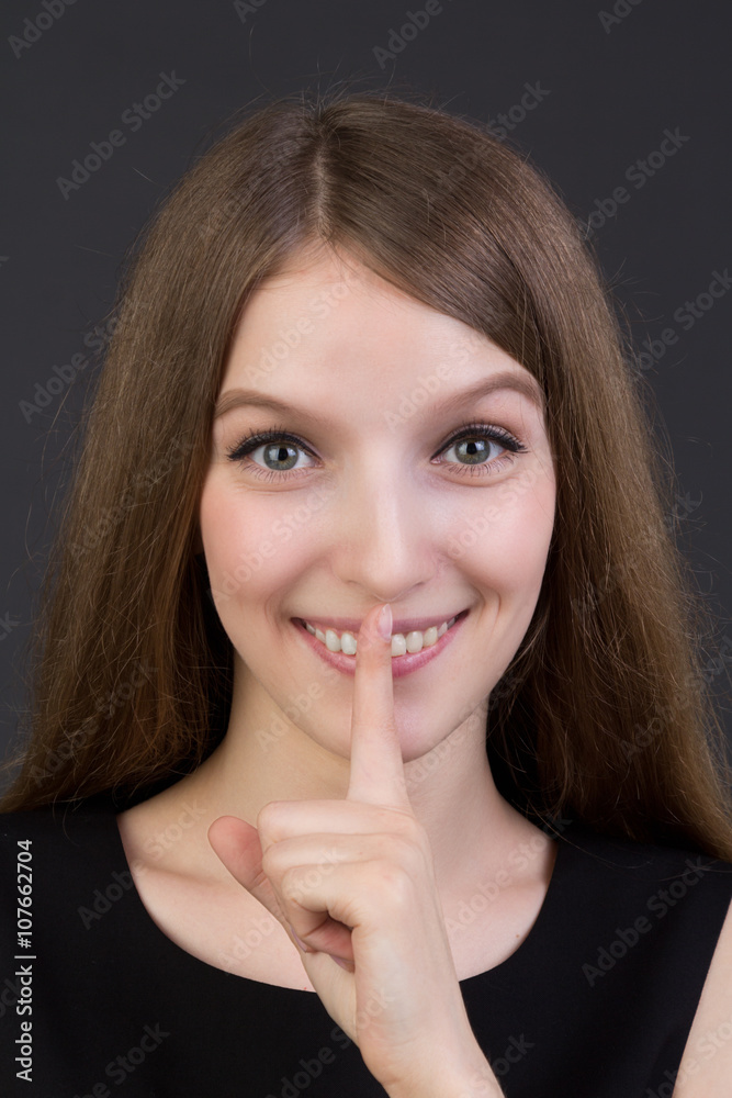 Portrait of a young beautiful girl smiling