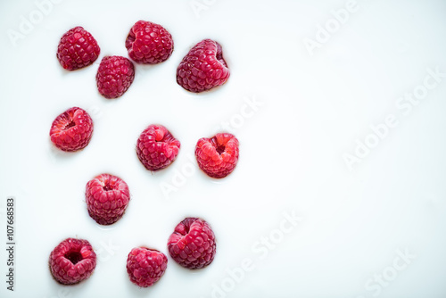 Yoghurt background with raspberries, copy space template