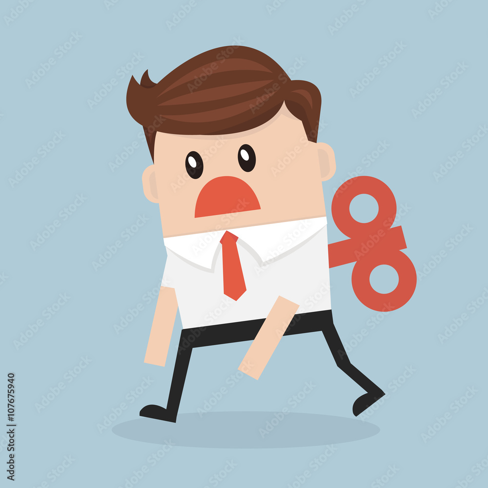 Businessman with wind-up key in his back. Businessman with wind-up key in his back.