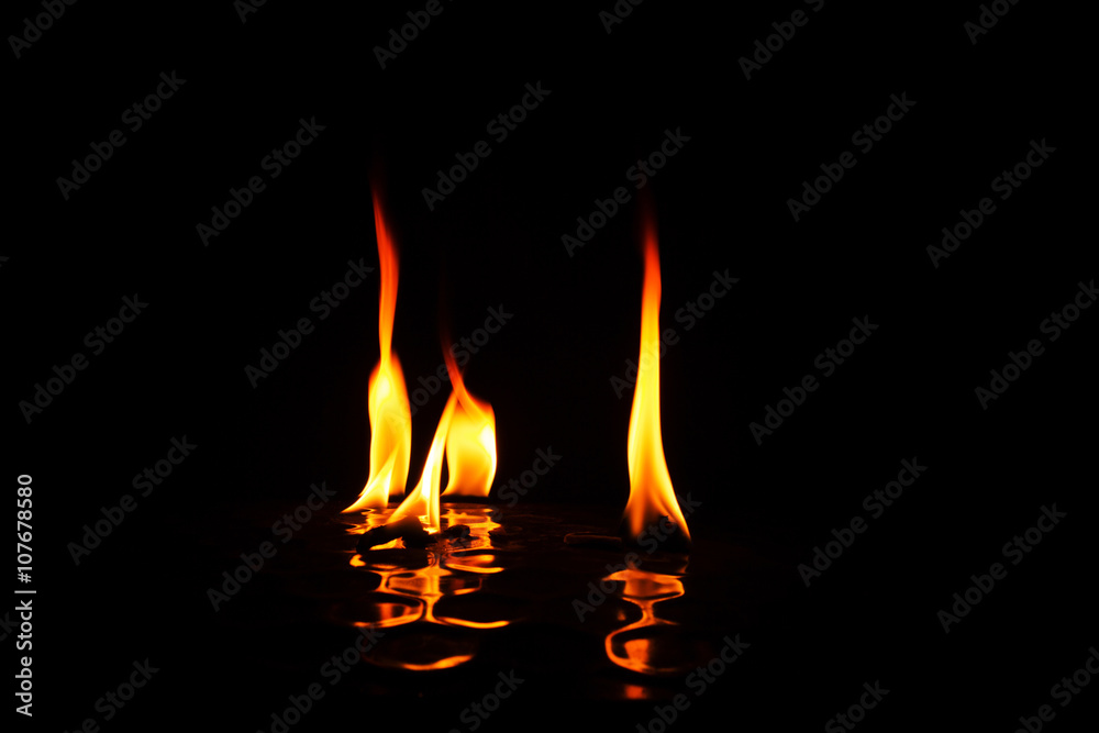 Individual flames of fire with reflection Individual flames of fire with reflection