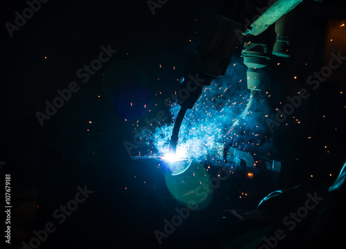 Welding robots movement in a car factory