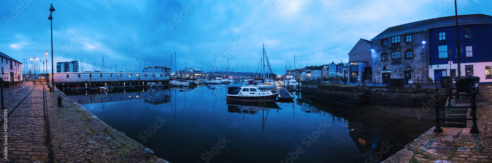 Panoramic view on marina quay in Plymouth, UK at sunrise.