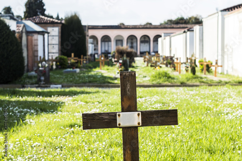 Cross with copyspace in a graveyard field