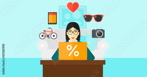 Woman shopping online using her laptop.