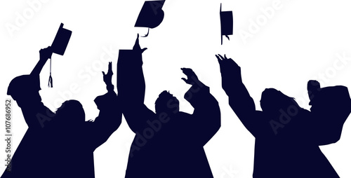students: students throw up their caps on graduation day