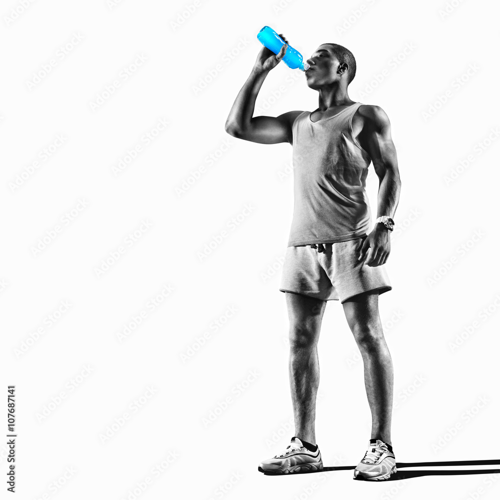 Young muscular build man silhouette drinking water of bottle after running, attractive athlete resting after workout outdoors, fitness and healthy lifestyle concept. Isolated on white
 - obrazy, fototapety, plakaty 