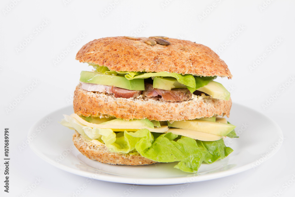 Sandwich with cheese, avocado, sirloin and lettuce Sandwich with cheese, avocado, sirloin and lettuce