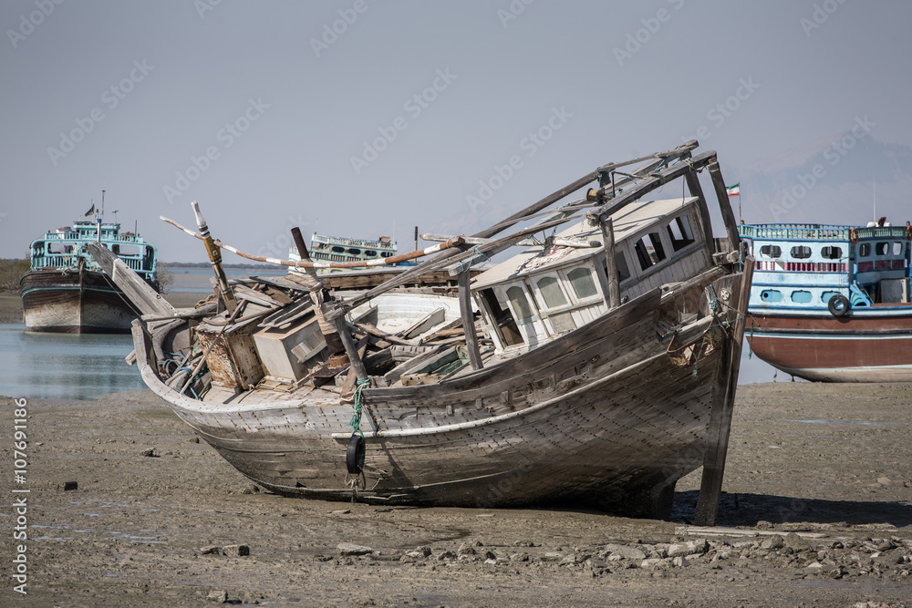 Old abandoned wooden boat in Bandare Loft village on Qeshm islan