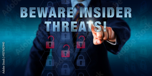 Obraz na plátně Employee Pressing BEWARE INSIDER THREATS!