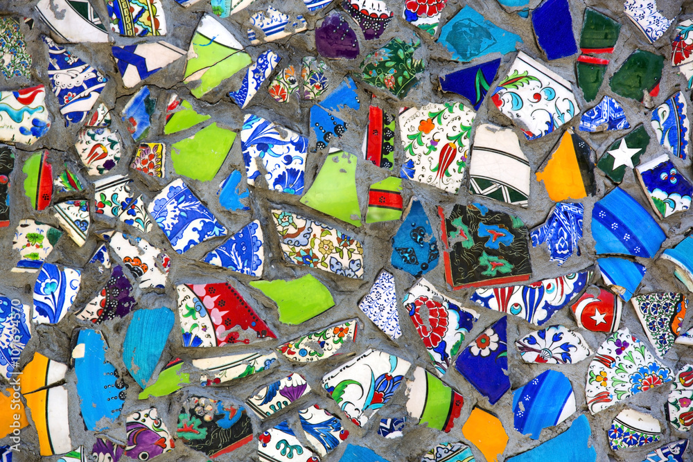 wall with broken ceramic plates colored fragments wall with broken ceramic plates colored fragments
