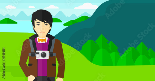 Man with camera on chest.