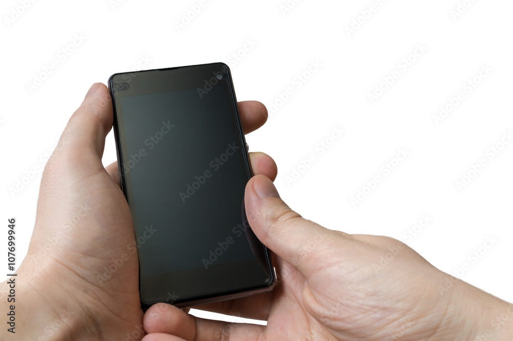 Hand holds smartphone in hand. Isolated on white background.