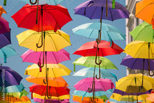 Colorful umbrellas un blue sky,