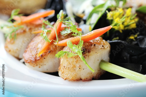 closeup of seared scallops