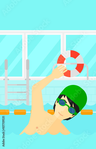 Swimmer training in pool.