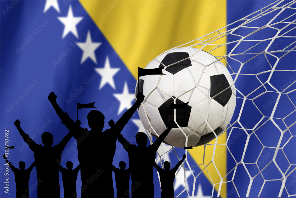 Φωτογραφία silhouettes of Soccer fans with flag of Bosnia and Herzegovina.C