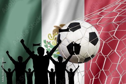 silhouettes of Soccer fans with flag of Mexico .Cheer Concept
