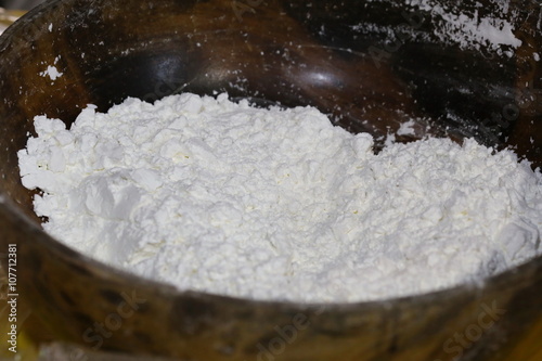 flour in wood bowl