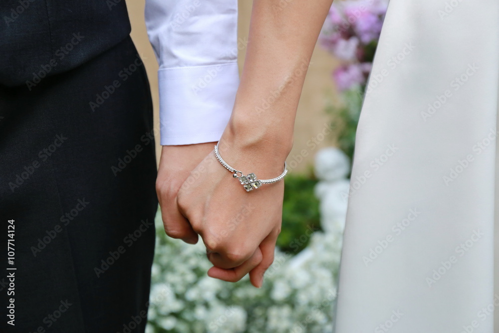 Fototapeta premium couple man and women hold hand togethe