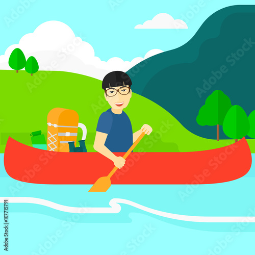 Man canoeing on the river. © Visual Generation