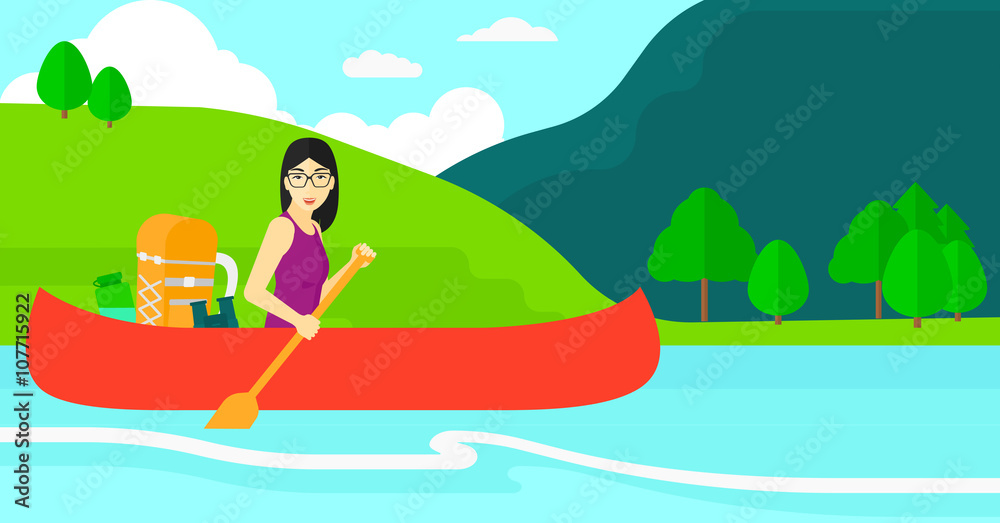Woman canoeing on the river.