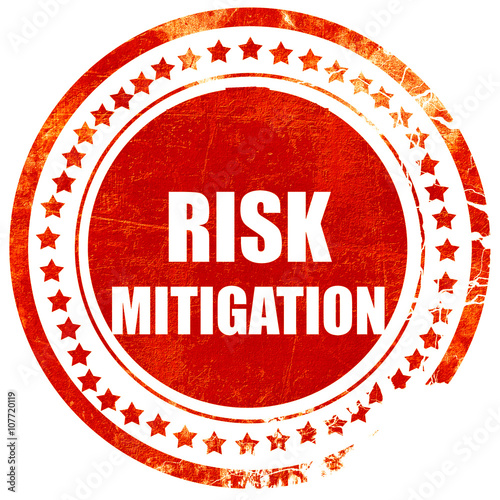 Risk mitigation sign, grunge red rubber stamp on a solid white b photo