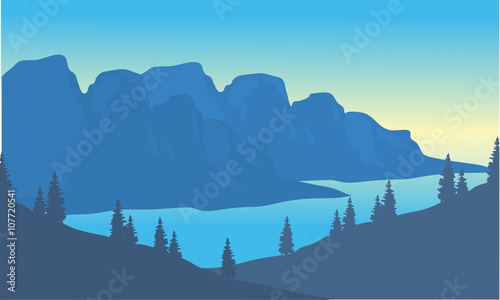 Silhouette of river and mountain background
