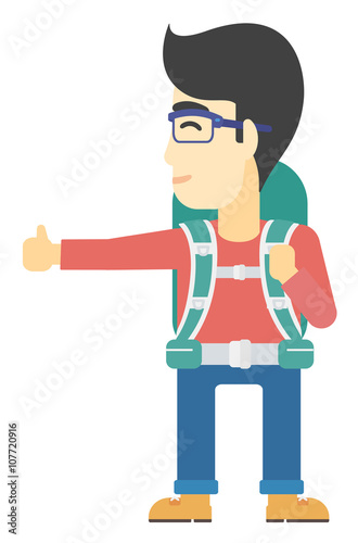 Young man hitchhiking.