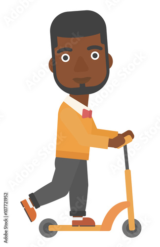 Man riding on scooter.