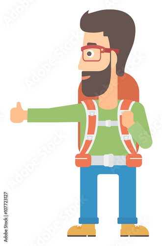 Young man hitchhiking.