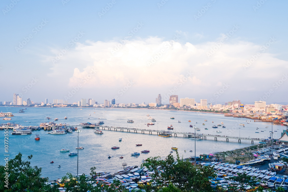 Pattaya Harbor and city view in the sunset.