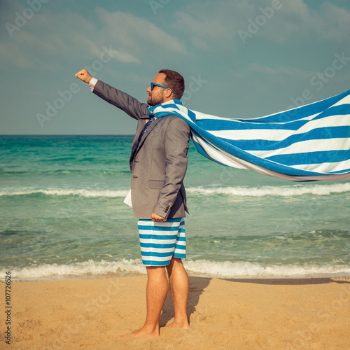 Funny businessman on the beach © Sunny studio