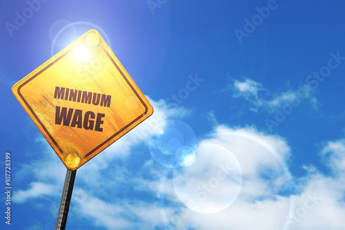 Yellow road sign with a blue sky and white clouds: Sweat shop ba photo