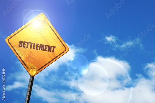 Картината върху платно Yellow road sign with a blue sky and white clouds: settlement