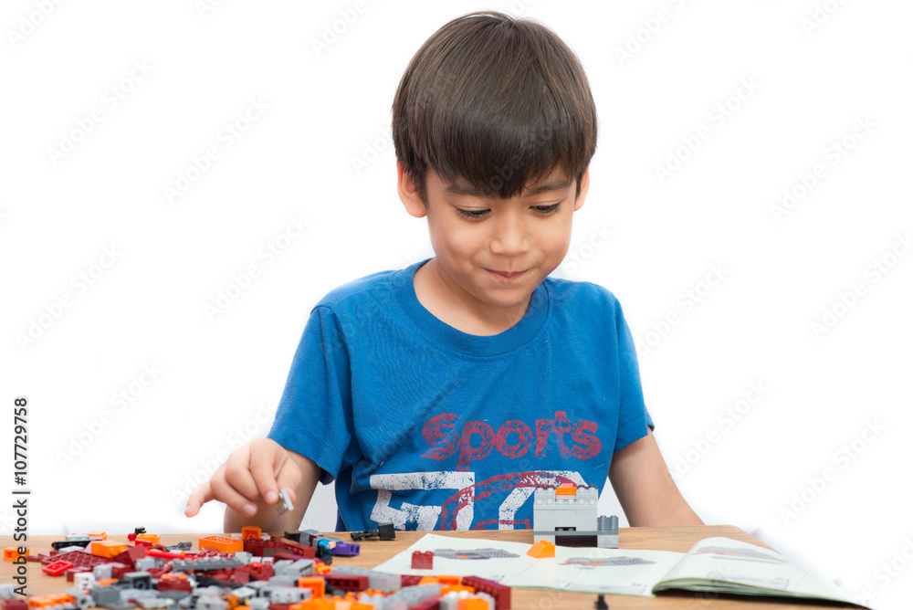 Little boy playing block indoor house education Little boy playing block indoor house education