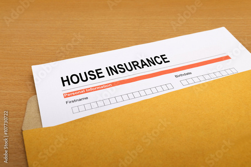 House Insurance application form on brown envelope