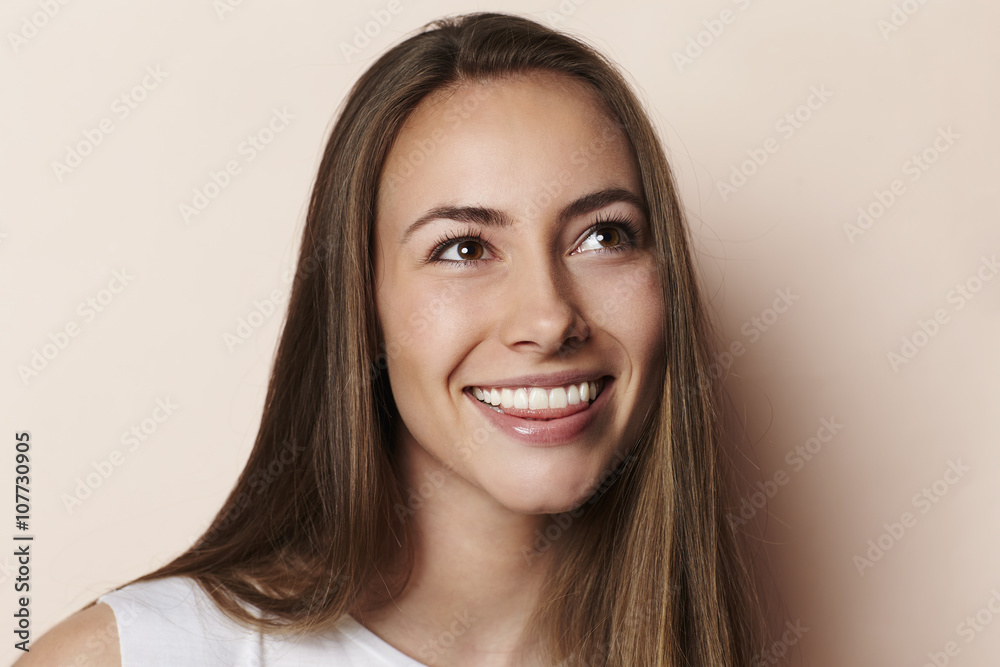 Beautiful young model smiling in studio Beautiful young model smiling in studio