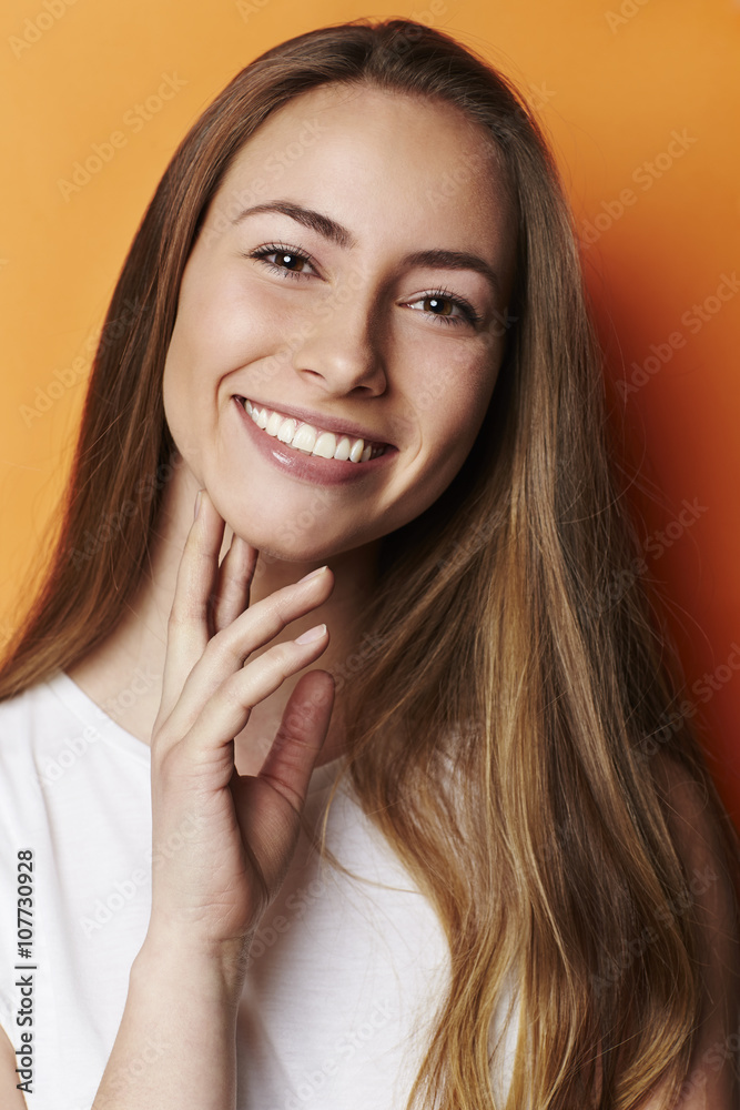 Gorgeous model smiling in studio, portrait Gorgeous model smiling in studio, portrait