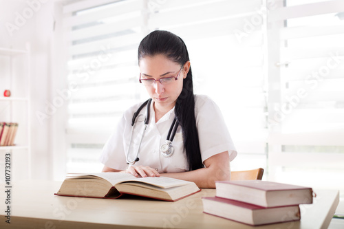 Medicine student learning in the office