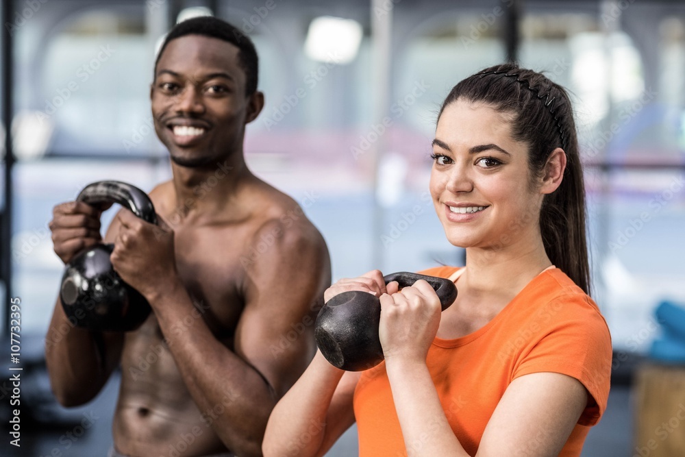Athletic man and woman working out Athletic man and woman working out
