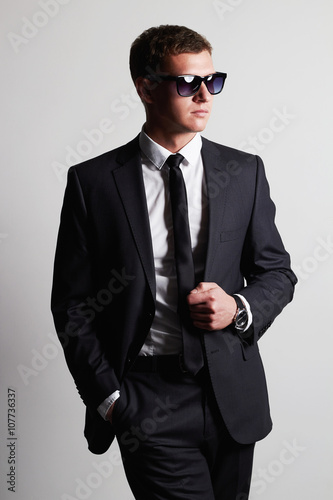 Men in suit.confident young businessman in sunglasses.handsome man