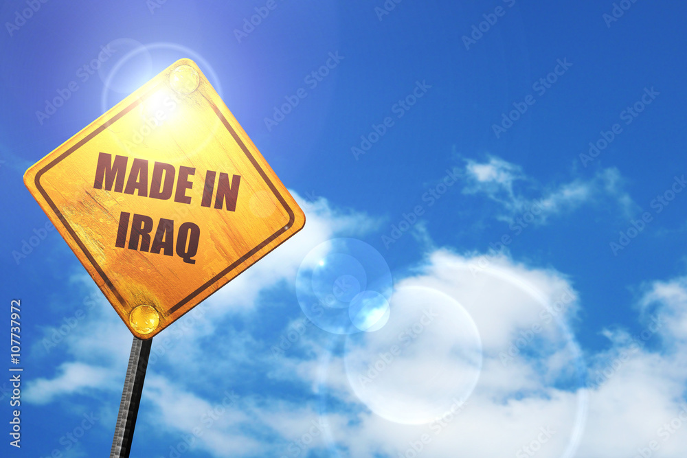 Naklejka premium Yellow road sign with a blue sky and white clouds: Made in iraq