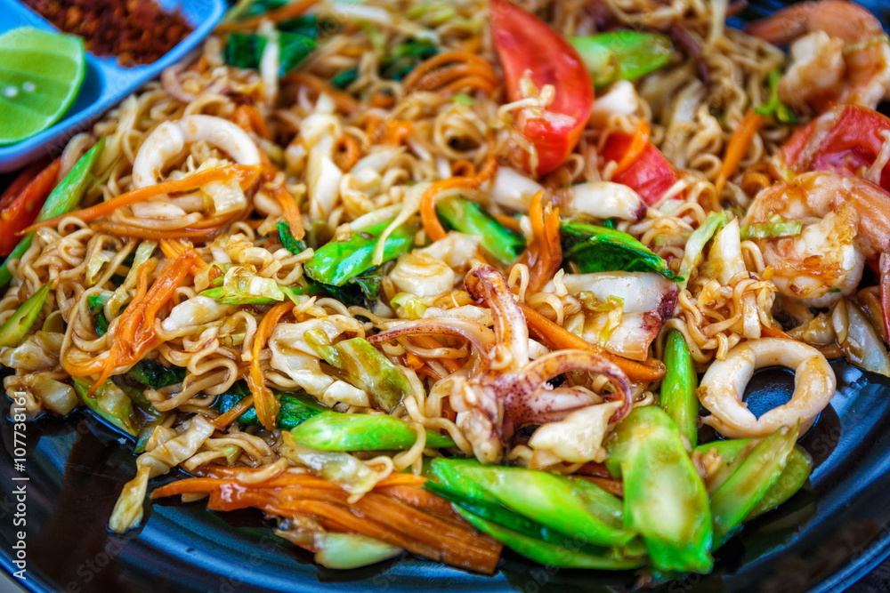 Seafood pad Thai dish with shrimp in Thailand