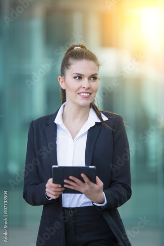 Businesswoman using a digital tablet Free Download Businesswoman using a digital tablet - GFXLoad