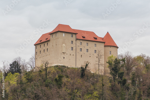 Brestanica, Slovenia - April 2, 2016. View of the Rajhenburg castle on the top of the hill.