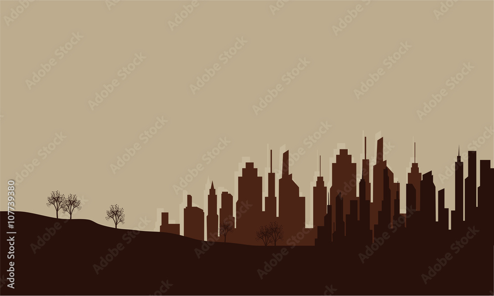 Silhouette of city on the field